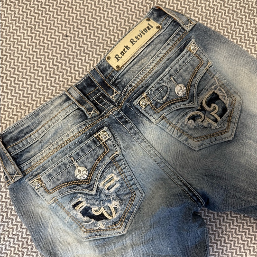 Rock Revival Blue Distressed Jeans with Embroidered Details